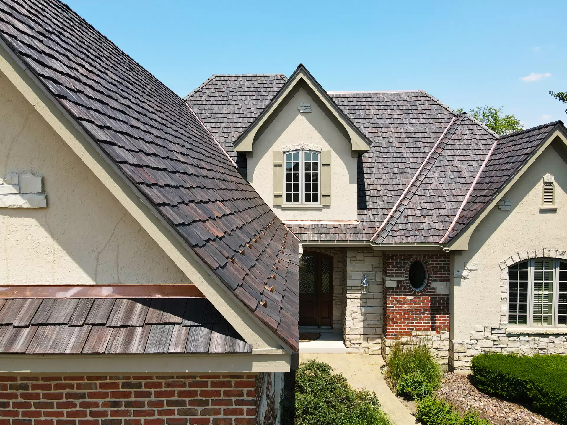 Grid of skylights on dark roof
