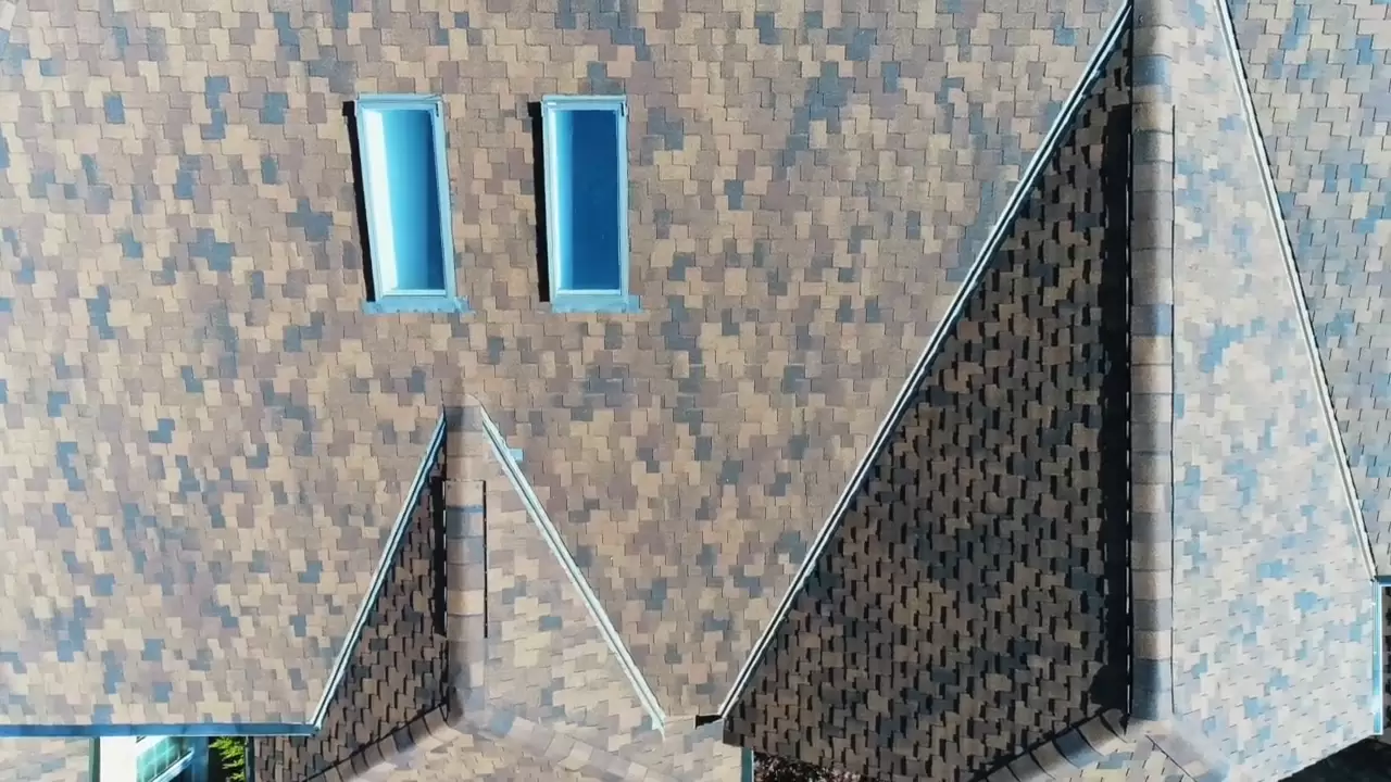 Two skylights on brown roof