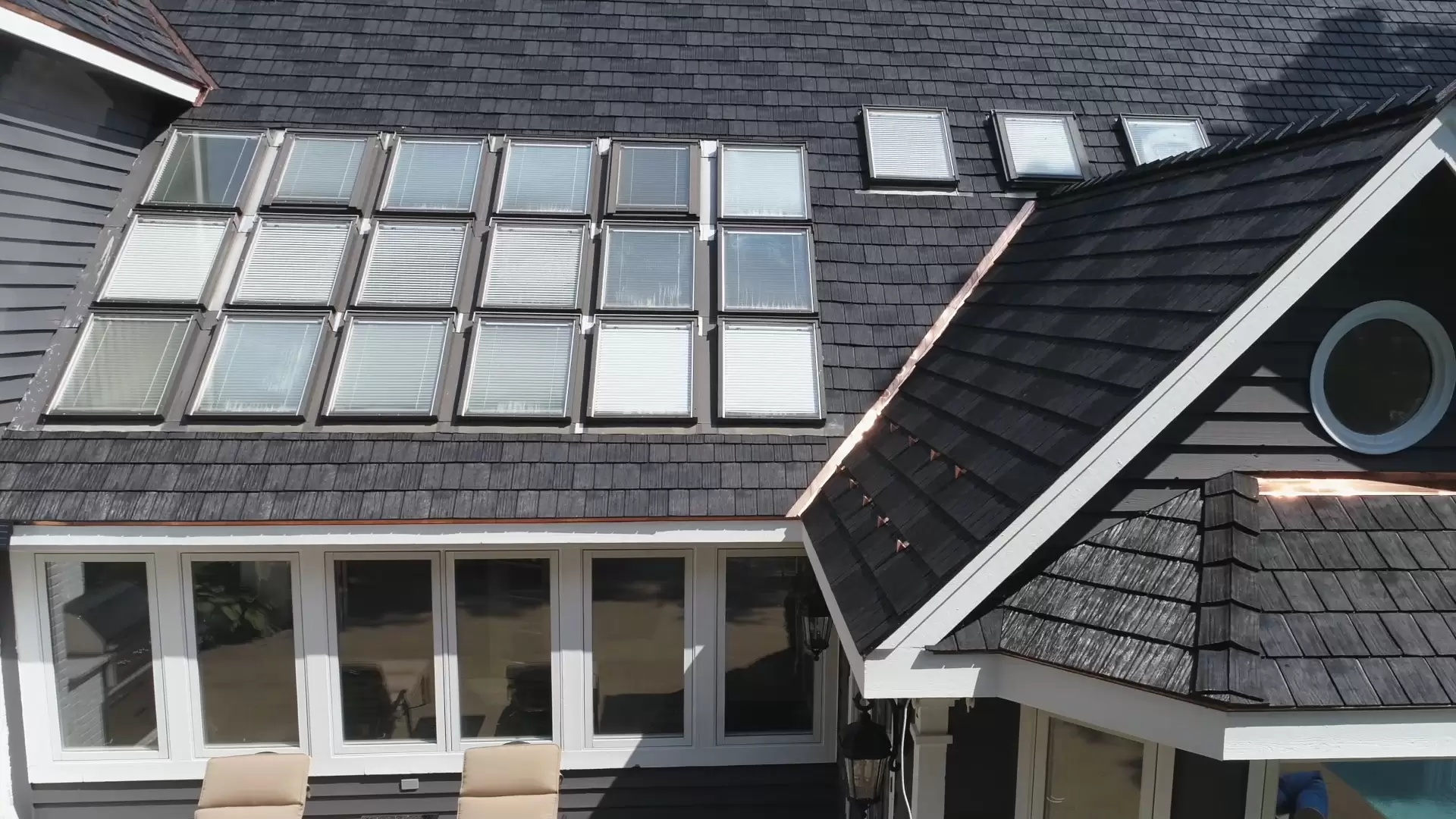 Grid of skylights on dark roof