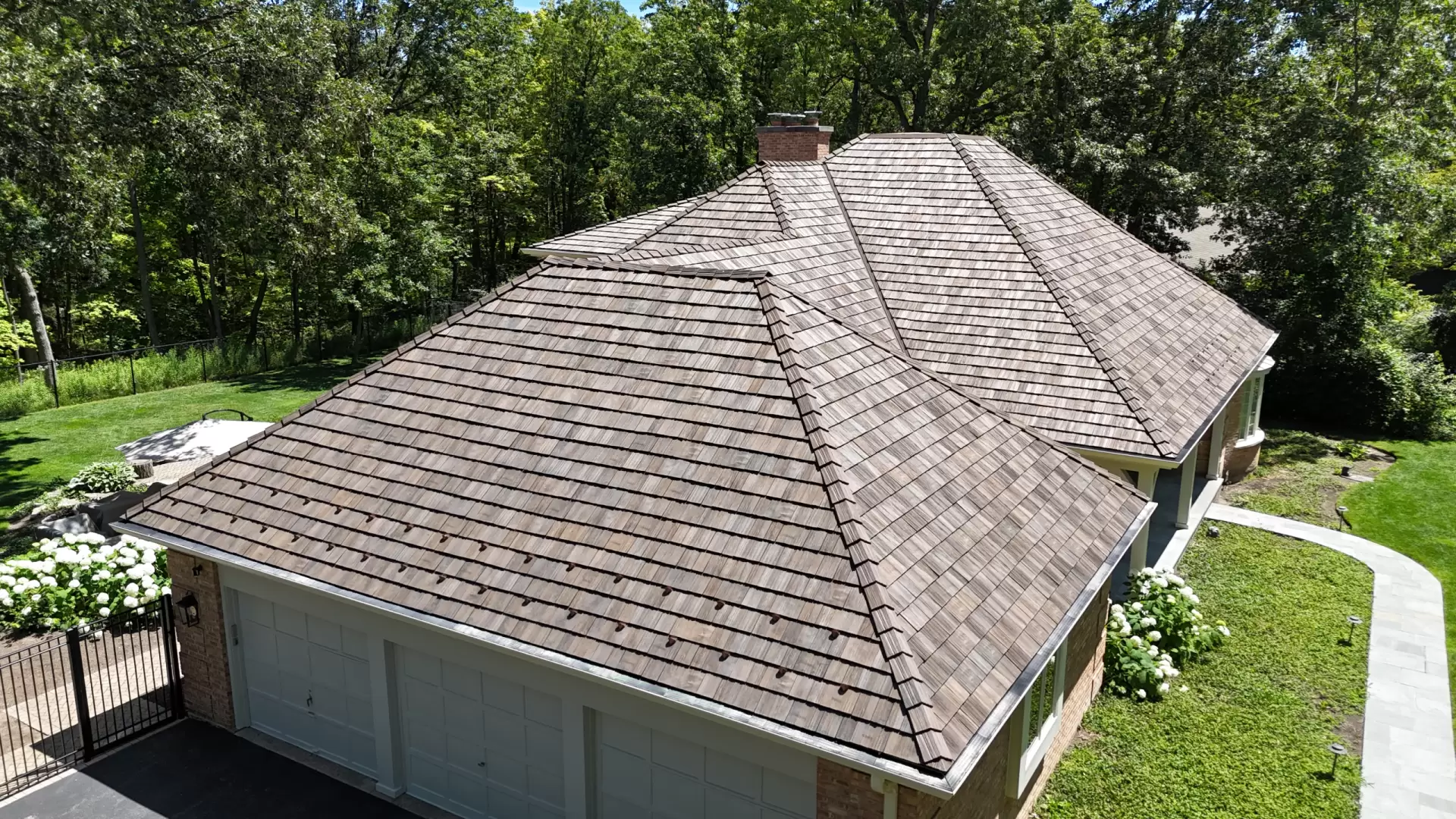 Large skylight next to window on grey roof