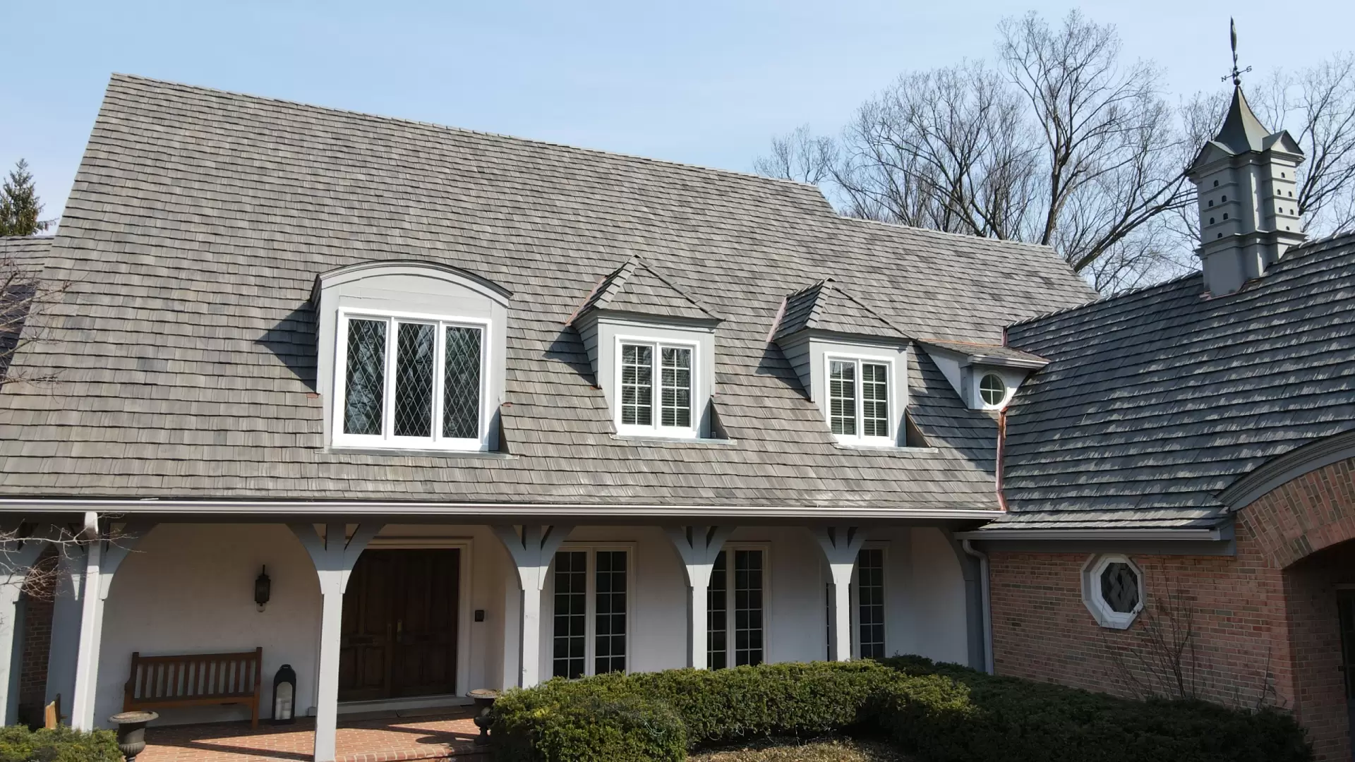 Grid of skylights on dark roof