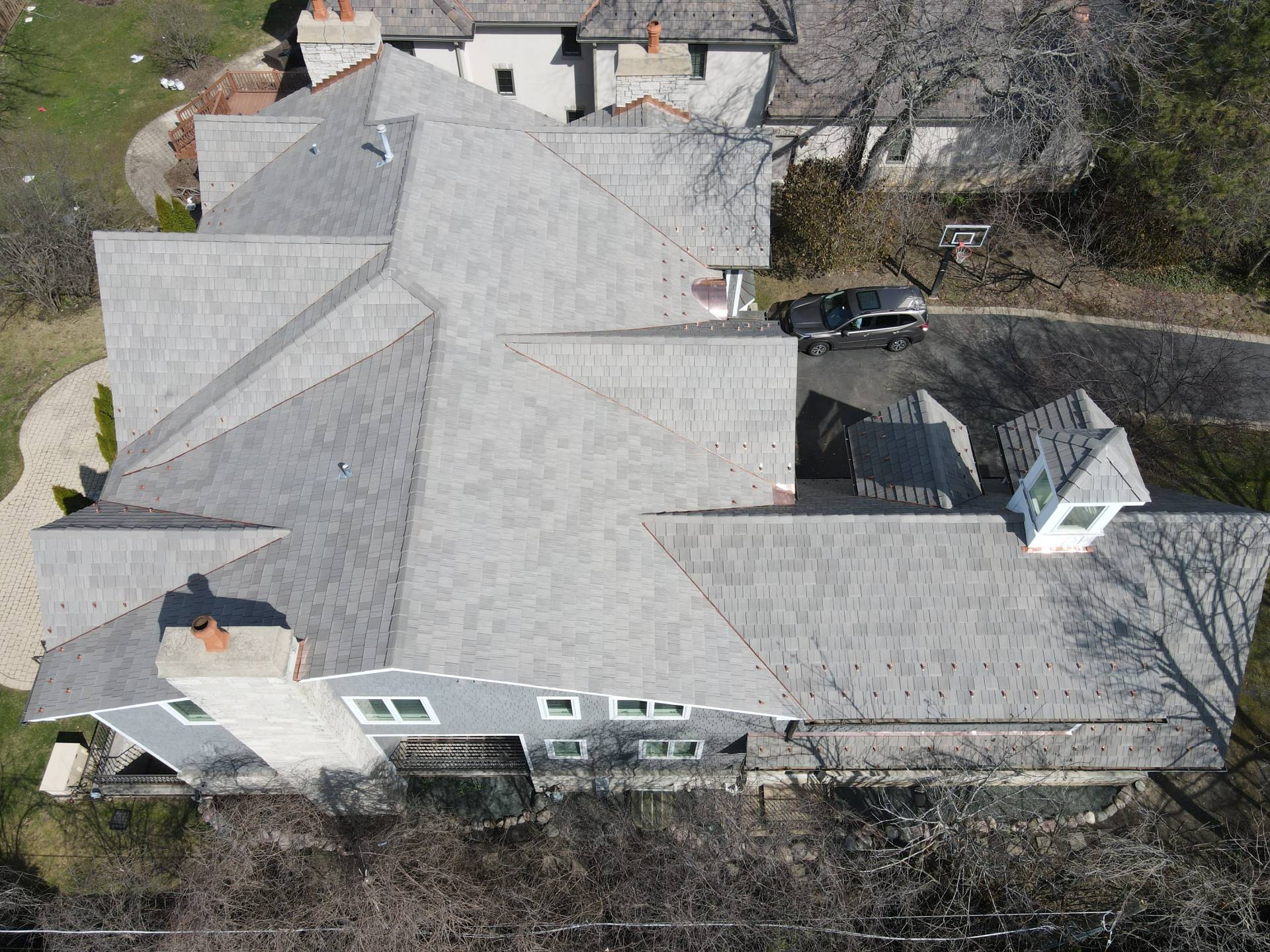 Two skylights on brown roof