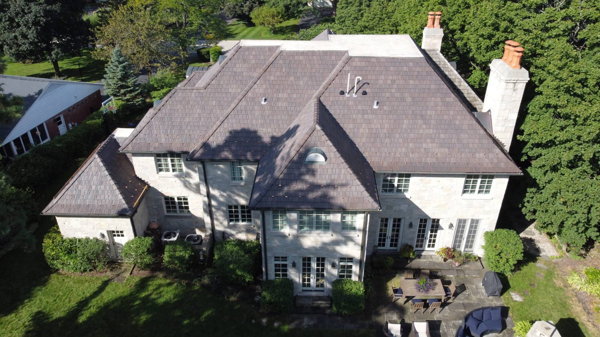 Two skylights on dark metal roof